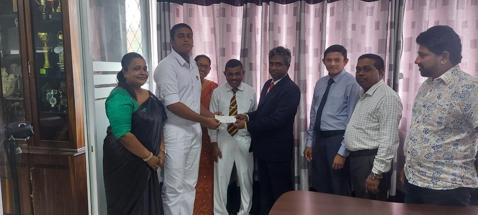 Sponsoring the school cadet band instruments reparing project